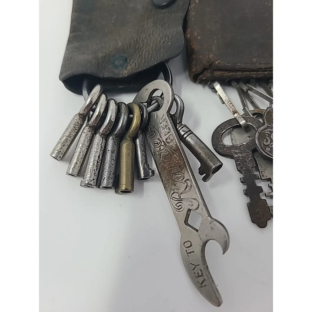 Collection Of 17 Skeleton And Other Vintage Keys With Leather Key Holders